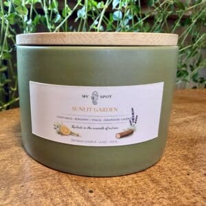 My Spot Sunlit Garden soy wax candle in olive green vessel with wood lid
